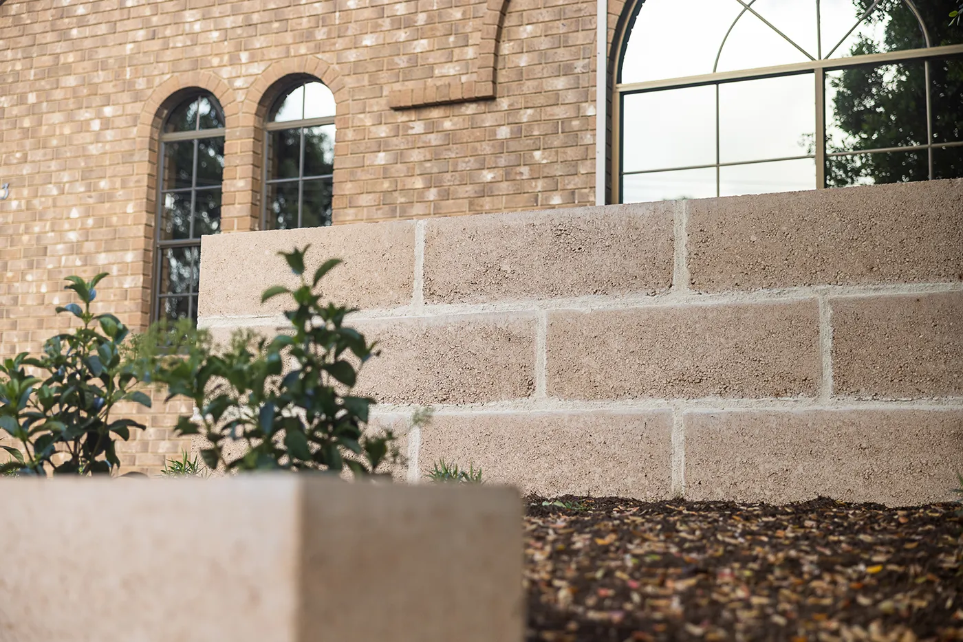 photo — finished retaining wall in golden light